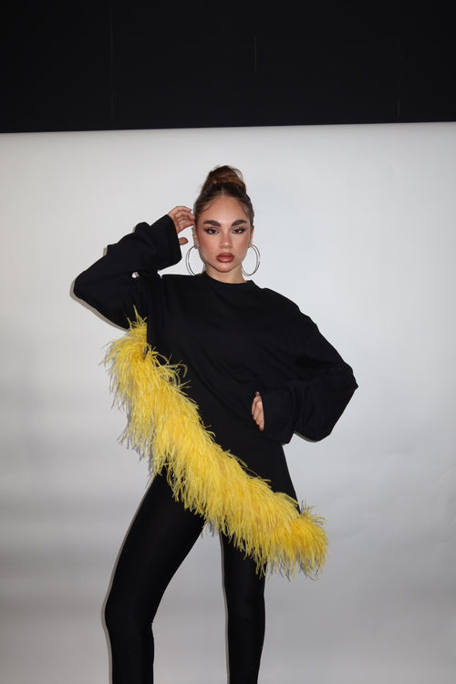 Maglia piuma asimmetrica