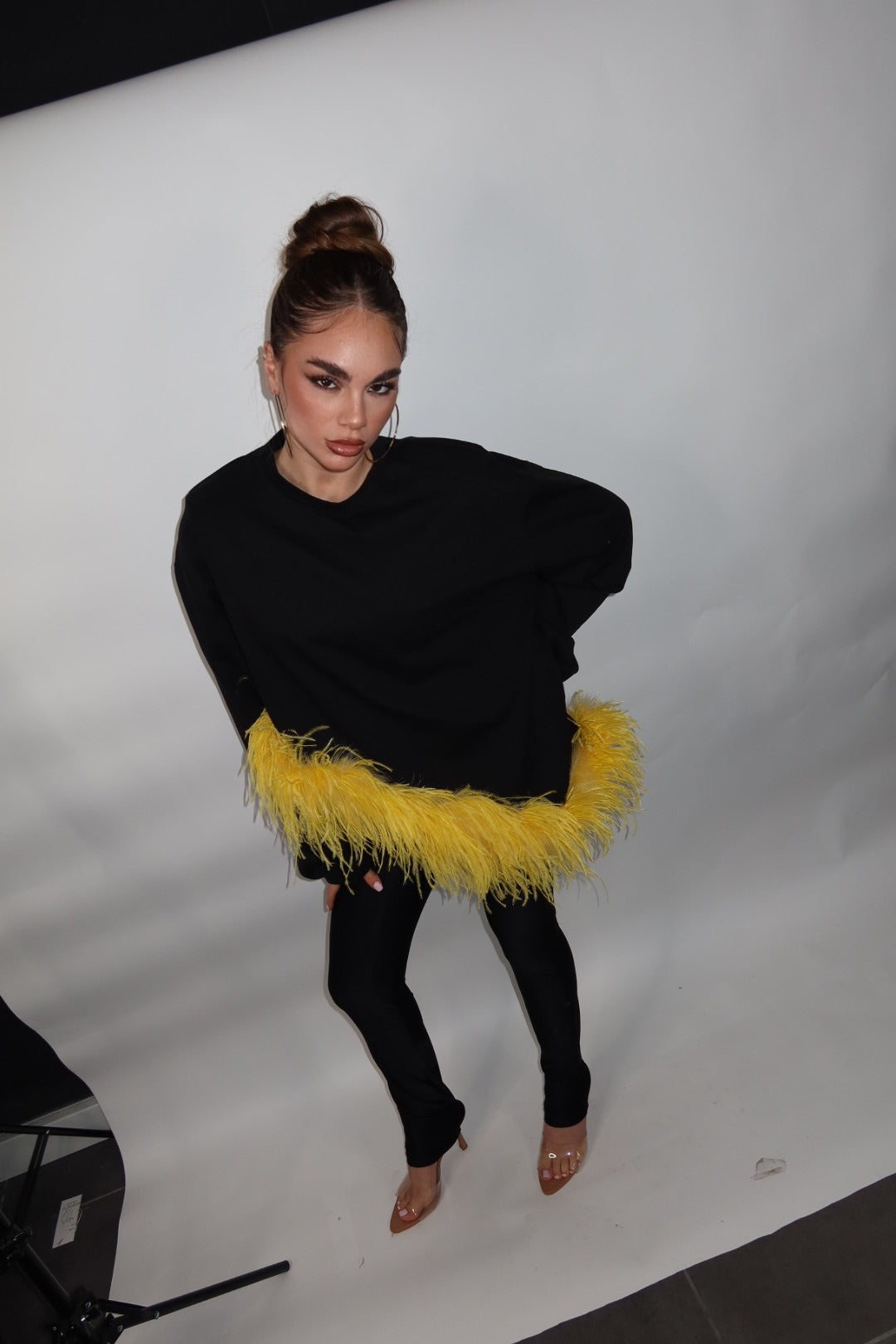 Maglia piuma asimmetrica